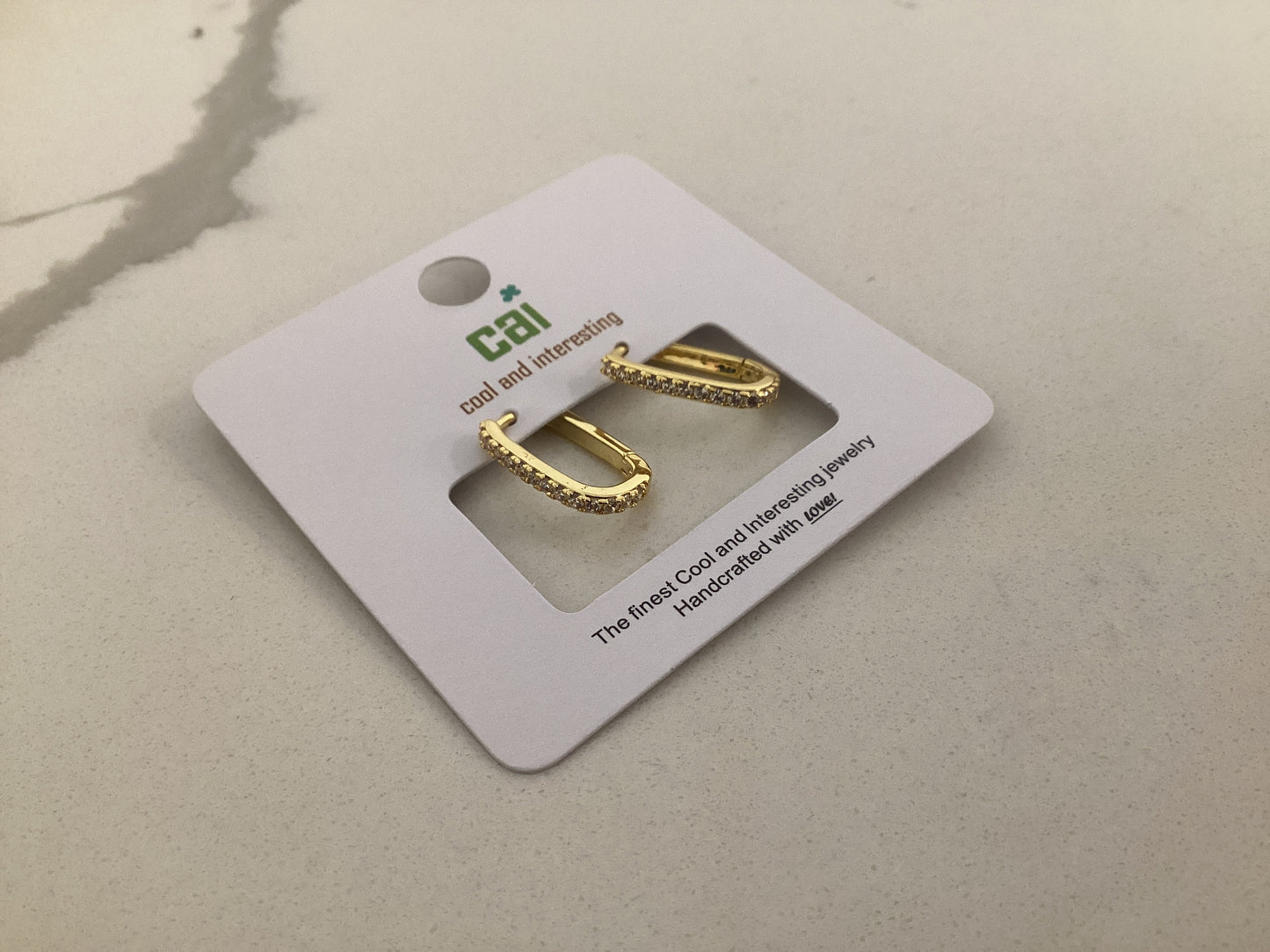 Gold Link White Stone Hugggie Earrings