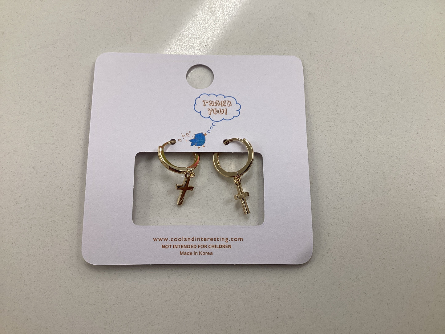 Gold Cross Huggie Earrings