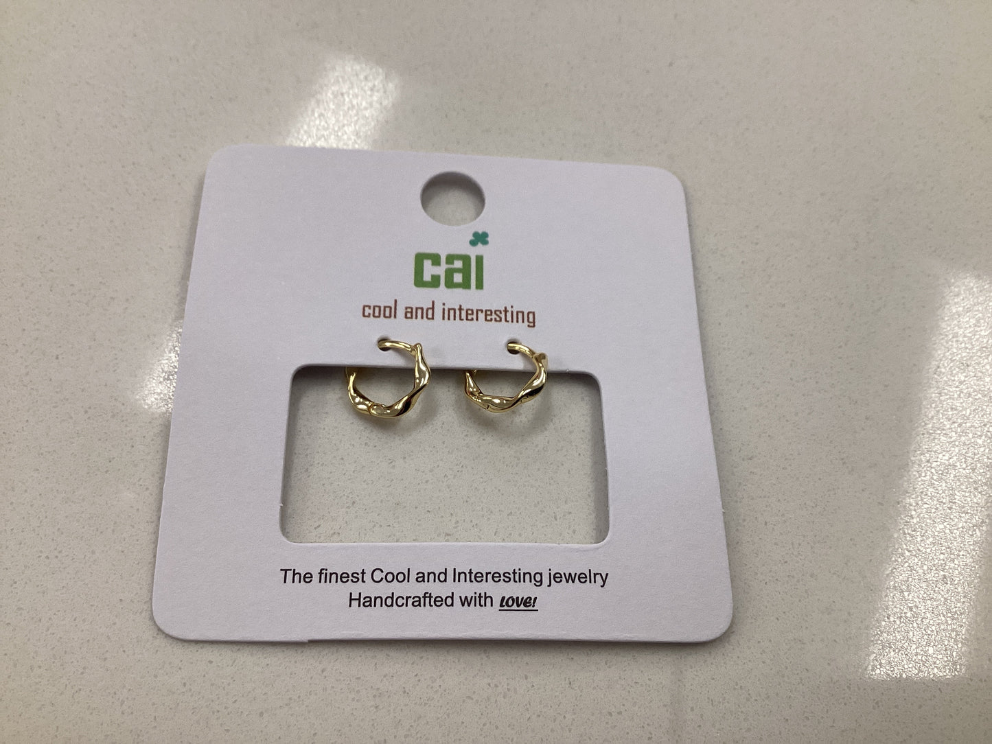 Gold Wave Huggie Earrings